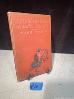 Front cover of Extracts From Adam's Diary book showing author's name, title, and illustration.