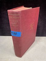 Front cover of red cloth hardcover book Caesar and Christ showing spine and gold text