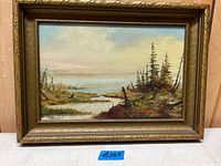 Full view of vintage oil on board landscape painting in gilded frame