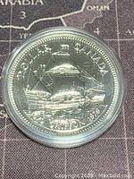 Obverse of the coin showing the Griffon ship design and inscriptions.
