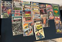 Full view of comic book lot featuring Batman, Buffy, She-Hulk, Prototype, Superman, Age of Apocalypse Infinity and more.