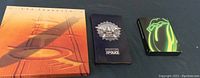 Photo of the front covers of the Led Zeppelin 4-CD set, The Police CD collection, and the Rolling Stone 4-disc DVD set.