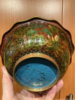 Bottom view showing blue base and wear marks