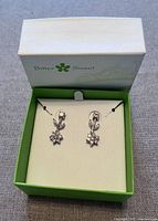 Silver-tone floral rhinestone stud earrings in Bitter Sweet box