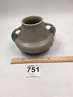 Front and side view of Roseville Tuscany vase showing shape and color, ruler for size reference