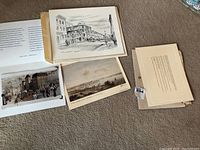 Overview of three prints showing signed princess street print, ruins of the fort print and photograph of mural painting.
