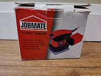 Front of the original Jobmate box showing product image and key features including single speed 13,000 OPM, die cast aluminum sole plate, dust protected rocker switch, and soft-coated palm grip.