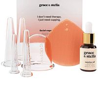 Full set displayed: 5 clear plastic facial cups, silicone facial pad, and carrier oil bottle with dropper.