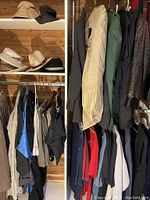 Image showing a variety of men's hats including bucket hats, a white cowboy hat, and a fedora on shelves above hanging men's pants and jackets in neutral colors.