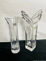 Front view of both Mikasa crystal vases side by side showing their shapes and labels