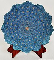 Front view of the hand-enameled Persian plate showing detailed mandala pattern and vibrant blue tones.