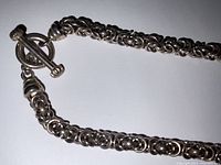 Close-up of chainmaille pattern and toggle clasp