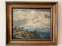 Full view of framed oil painting showing entire coastal scene and frame