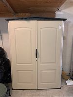Front view with closed double doors