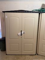 Front exterior view with closed double doors