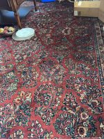 Full view and pattern detail showing red base and floral design.