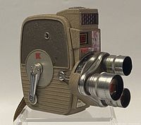 Full side and front view of the Keystone KA-1 Electric Eye 8mm Film Camera showing the textured casing, crank, and front lenses.
