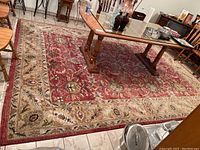 Full view under glass-topped dining table showing overall color and pattern.