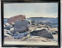 Frontal view of framed watercolor painting showing the detailed rocky coastline and ocean scene with distant islands, signed Savage 81.