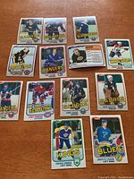 Overview photo showing 13 hockey cards from the 1981-82 Topps set, each card depicting various NHL players in colorful team uniforms, clear text, and near mint condition.