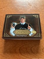 Top view of the stack of 2005/06 Upper Deck Diary of a Phenom hockey cards showing the front card depicting Sidney Crosby holding a puck with 'Diary of a Phenom' text.