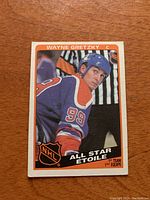 Front view of the 1984/85 Wayne Gretzky hockey card, showing him in Edmonton Oilers jersey with All Star 1st Team designation.