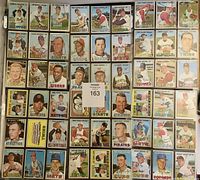 Full front view of 63 1967 Topps baseball cards arranged in rows featuring various players from multiple Major League Baseball teams in color images with player names and teams visible.