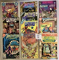Top view of 10 DC comic books laid out, showing 7 Amethyst covers, 2 Superman and 1 Batman comic.