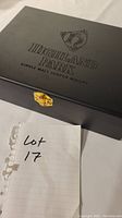 Closed black box showing embossed Highland Park Single Malt Scotch Whisky logo and gold latch