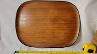 Top view of the Mid-Century Modern teak laminate bentwood tray showing the rectangular shape with rounded corners and wood grain pattern.