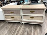 Photo showing both matching nightstands side by side, highlighting pecan walnut finish and metal handles