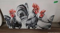 Photo of canvas print showing three roosters with red combs and wattles on a white background, dimensions 24x37 inches.