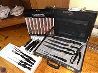 Overview of all knife sets on wooden surface
