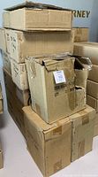 Boxes stacked, likely containing the cherubs and candles