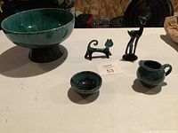 Photo of all five Blue Mountain Pottery items together: large footed bowl, small bowl, small pitcher, cat and deer figurines.