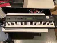 Full front view of keyboard controller on table