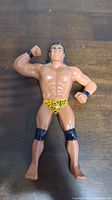 Front view of LJN Superfly Jimmy Snuka wrestling figure showing the muscular physique, facial painting, and leopard print trunks.