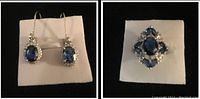Photo showing one pair of earrings with blue oval stones surrounded by clear stones, and a ring with a blue oval stone and clear stone accents.