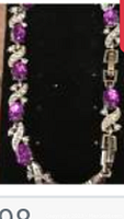Front view of necklace showing purple oval gemstones alternating with clear crystal links on a silver-tone setting.