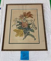 Framed 20th-century hand colored floral print showing overall condition and framing.