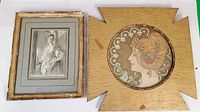 Overall view of two framed lady portrait artworks side by side