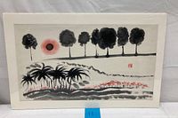 Full image of the framed Chinese ink landscape painting with trees and red sun, mounted on mat board.
