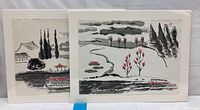 Two paintings side by side showing similar style black ink and red-highlighted landscapes with water, trees, and buildings.