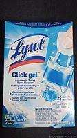 Close-up of one Lysol Click Gel box showing product name, use (automatic toilet bowl cleaner), scent, and contents details.