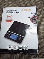 Photo of the Ataller Nutritional Kitchen Scale box showing the scale image, features and brand name