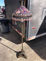 Full view of lamp showing shade, base and height