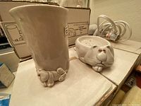 One Fitz & Floyd Cat-Nap soap dish and tumbler displayed in front of original cardboard box