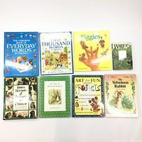 All 8 children's books laid out showing front covers