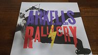 Front cover of Arkells Rally Cry vinyl LP album showing artwork with band microphone and arm in design.