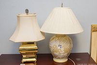 Photo of both Asian style lamps together showing size and design differences.